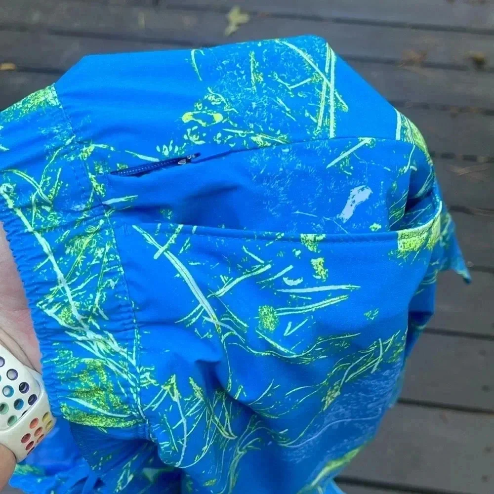 North Face mens blue and green design shorts size large